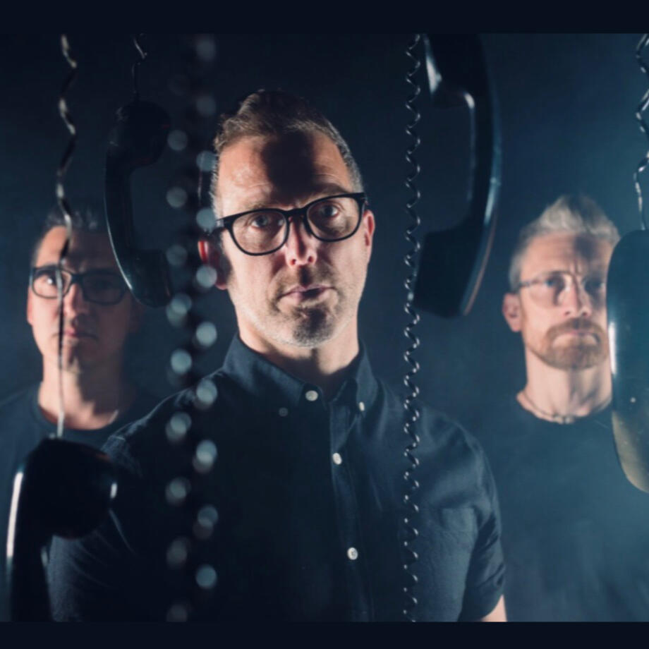 Photo of the three members of Black Hats – Oxford-based new wave band